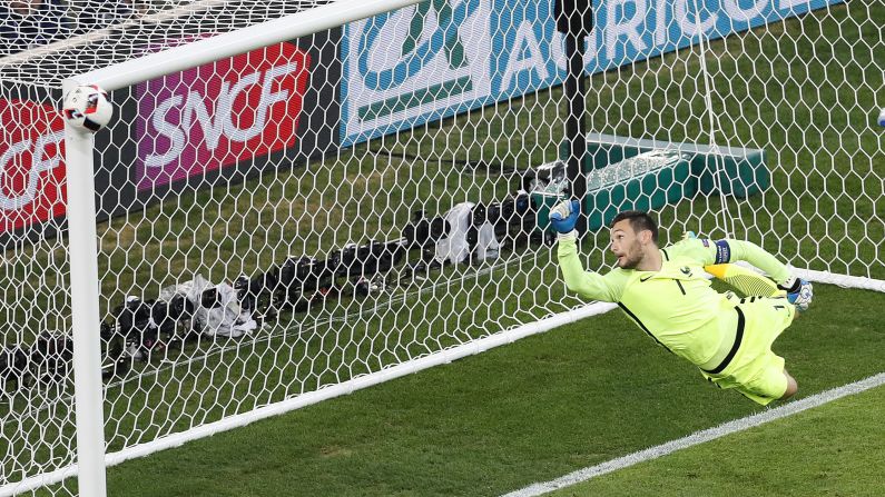 French goalkeeper Hugo Lloris watches as a shot from Germany's Joshua Kimmich hits the post late in the second half.