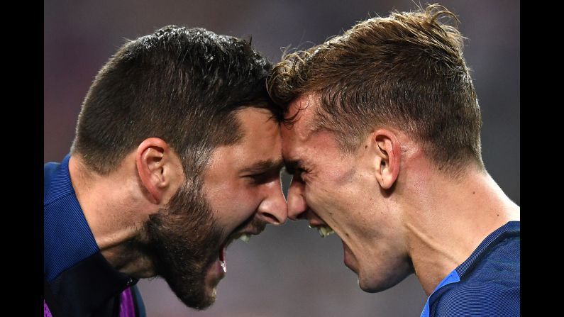 Griezmann, right, celebrates the second goal with teammate Andre-Pierre Gignac.