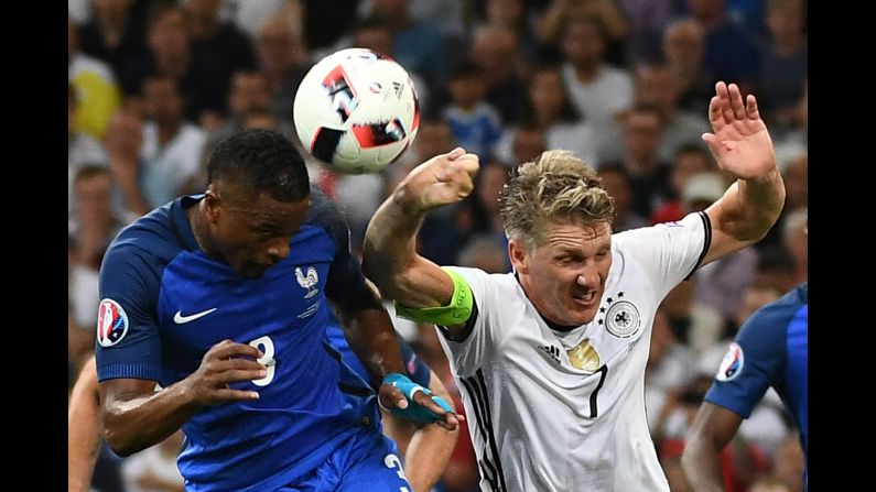 The penalty was awarded after Germany's Bastian Schweinsteiger, right, handled the ball in the box.