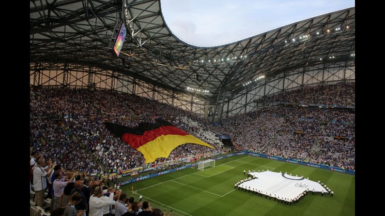 Germany fans wave a large flag in the Velodrome stadium before the match in Marseille, France.