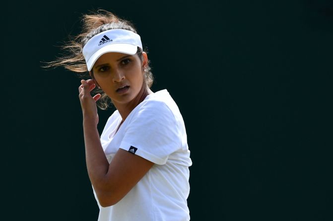 Sania Mirza (pictured) won the women's doubles title last year with Martina Hingis, but the top-ranked duo were shocked in Thursday's quarterfinals by fifth seeds Timea Babos and Yaroslava Shvedova, who will next play American No. 10 pairing Raquel Atawo and Abigail Spears. 