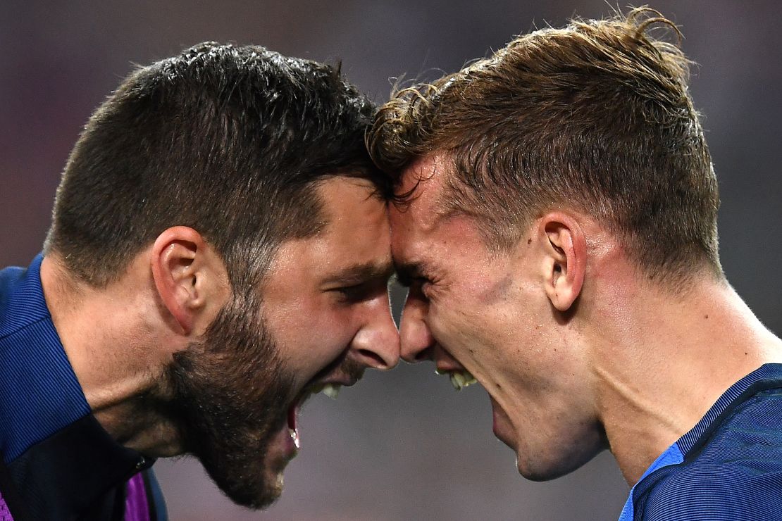 Griezmann celebrates with  Andre-Pierre Gignac after sending France through to the final.