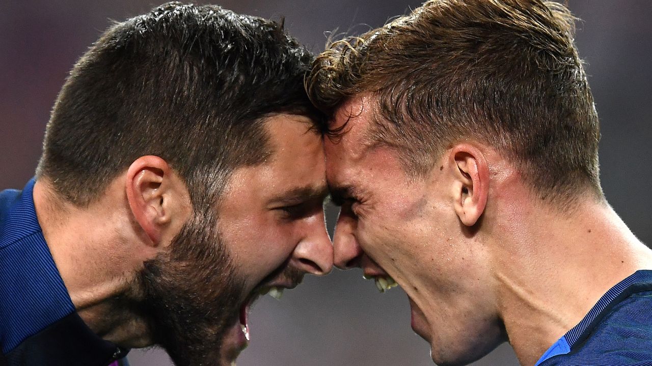 Griezmann celebrates with Andre-Pierre Gignac after sending France through to the final.