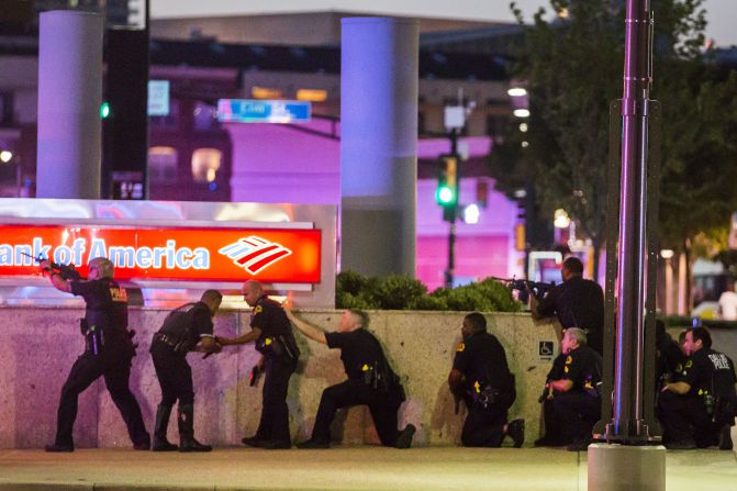 Police respond after shots were fired in downtown Dallas on Thursday, July 7. <a href="index.php?page=&url=http%3A%2F%2Fwww.cnn.com%2F2016%2F07%2F08%2Fus%2Fphilando-castile-alton-sterling-protests%2Findex.html" target="_blank">Five police officers were fatally shot </a>during a protest over recent police shootings in Louisiana and Minnesota. Seven other officers were injured in the ambush, as were two civilians.
