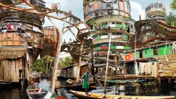 Pictured: Lagos Makoko Canal. Estimates vary on the population of Nigeria's infamous floating slum. Resident numbers range from 85,000 to 250,000. It was originally a small fishing village in the 18th century. Informal wooden homes are built on stilts, earning it the title "the Venice of Africa". 