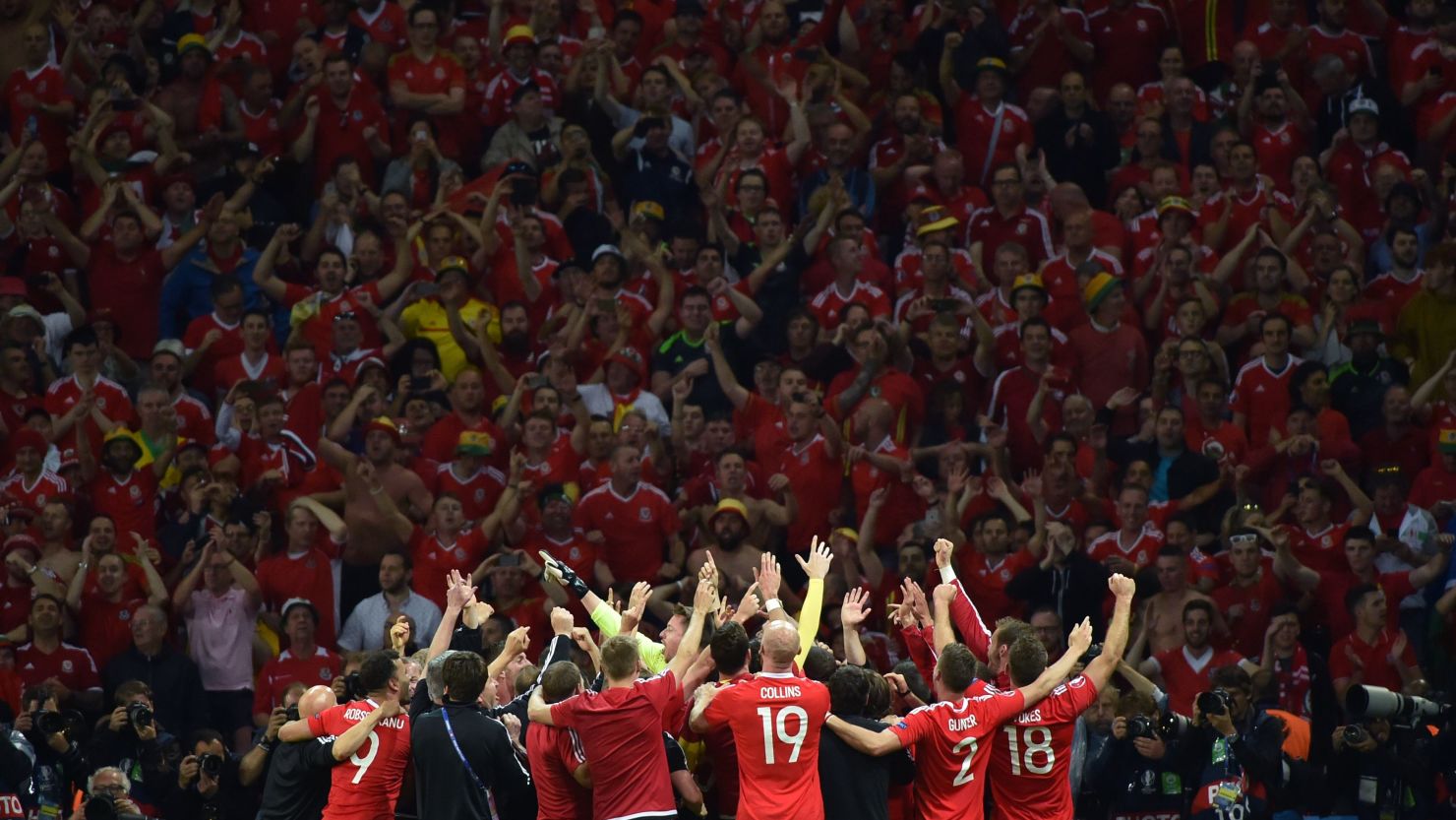 Wales players celebrate their team's 3-1 win over Belgium at Euro 2016.