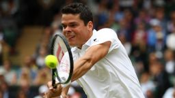 LONDON, ENGLAND - JULY 08:  Milos Raonic of Canada plays a backhand during the Men's Singles Semi Final match against Roger Federer of Switzerland on day eleven of the Wimbledon Lawn Tennis Championships at the All England Lawn Tennis and Croquet Club on July 8, 2016 in London, England.  (Photo by Clive Brunskill/Getty Images)