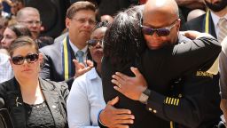 DALLAS, TX - JULY 08:  Dallas Police Chief David Brown is greeted with a hug at a prayer vigil following the deaths of five police officers last night during a Black Live Matter march on July 8, 2016 in Dallas, Texas. Five police officers were killed and seven others were injured  in a coordinated ambush at a anti-police brutality demonstration in Dallas. Investigators are saying the suspect is 25-year-old Micah Xavier Johnson of Mesquite, Texas. This is the deadliest incident for U.S. law enforcement since September 11.  (Photo by Spencer Platt/Getty Images)