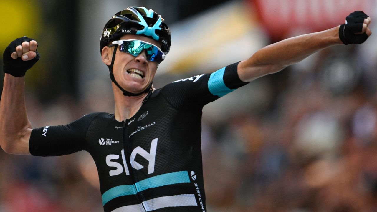 A triumphant Chris Froome punches the air after winning the 184 km eighth stage between Pau and Bagneres-de-Luchon.