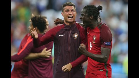 Cristiano Ronaldo celebrated with teammate Eder, the goalscorer, after Portugal defeated France 1-0 to win Euro 2016.