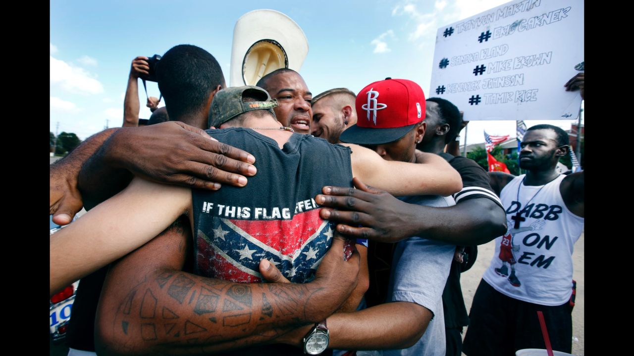 Strength in numbers. All Lives Matter protesters come together for a group hug with Black Lives Matter activists in Dallas. All Lives Matter showed up to the Black Lives Matter 