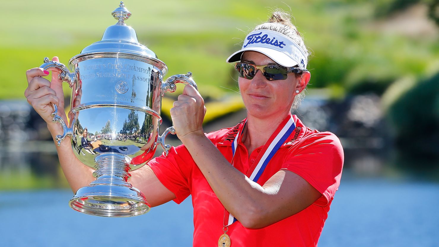 Brittany Lang poses with the trophy after defeating Anna Nordqvist to win the U.S. Women's Open.