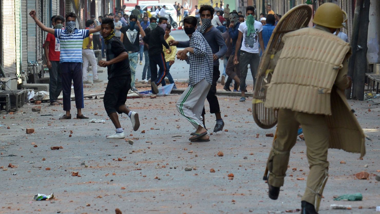 Police clash with Kashmiri protesters Monday in Srinagar.