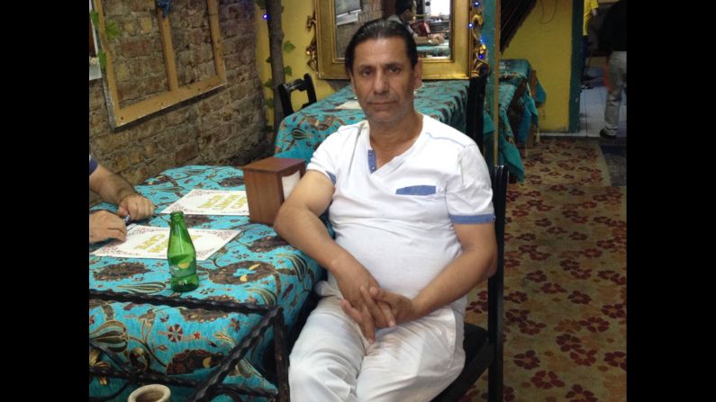 Alpaslan Esin runs a restaurant and has seen his debts pile up as fewer people eat out. "I'm in so much debt. I don't know how I'm going to pay it off," he said.