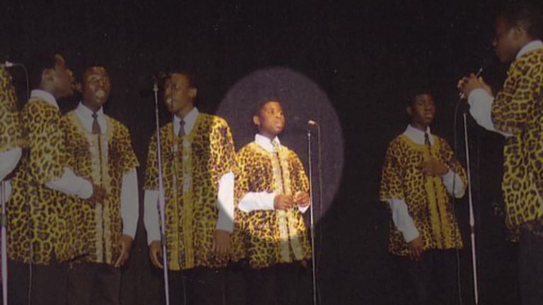 Given Kachepa as a child, performing with the choir.