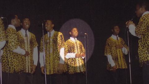 Given Kachepa as a child, performing with the choir.
