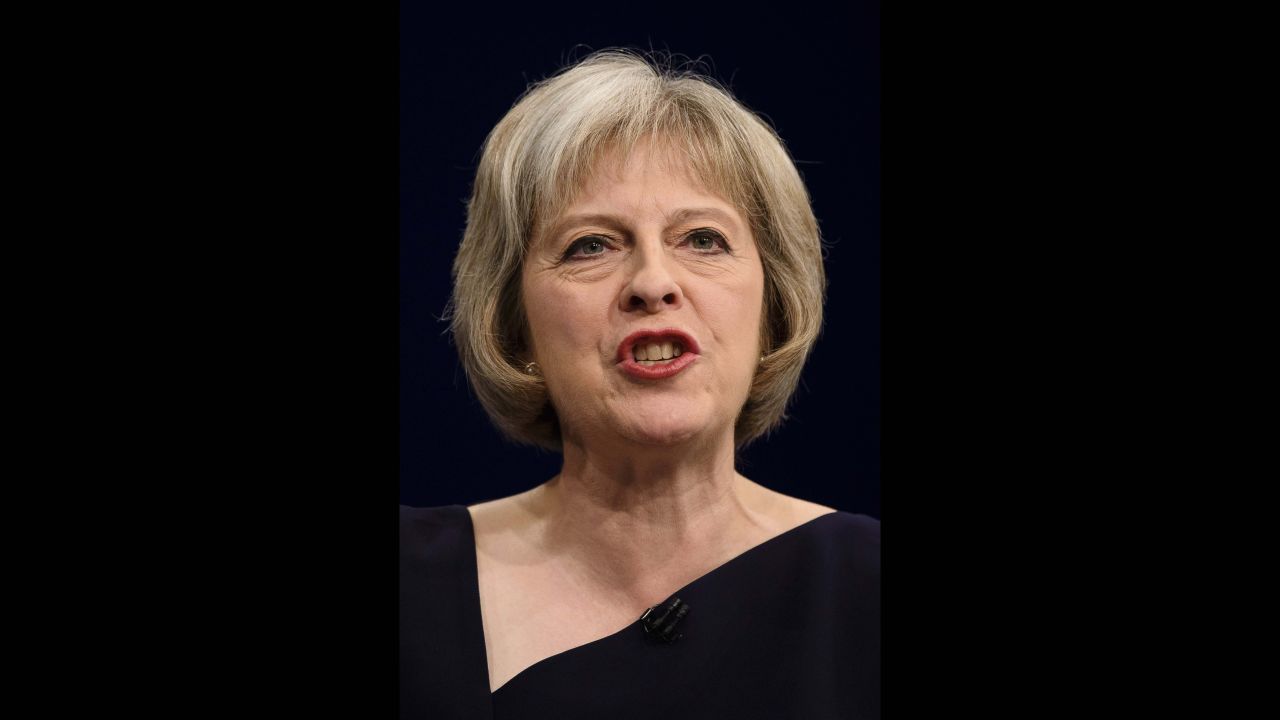 Britain's Home Secretary Theresa May addresses delegates on the third day of the annual Conservative party conference in Manchester, north west England, on October 6, 2015. AFP PHOTO / LEON NEAL        (Photo credit should read LEON NEAL/AFP/Getty Images)