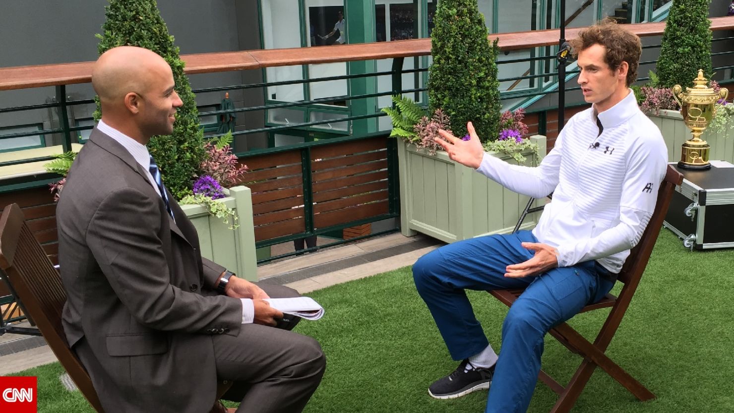 Wimbledon champ Andy Murray (right) spoke to CNN's James Blake about the change of gun laws after the Dunblane massacre in 1996. Murray was in a nearby classroom during the shooting. 