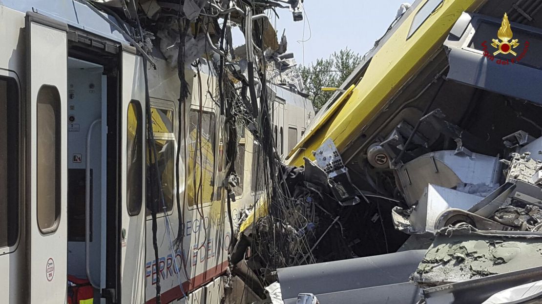The collision of two trains leave wagon cars crumpled at the scene Tuesday.