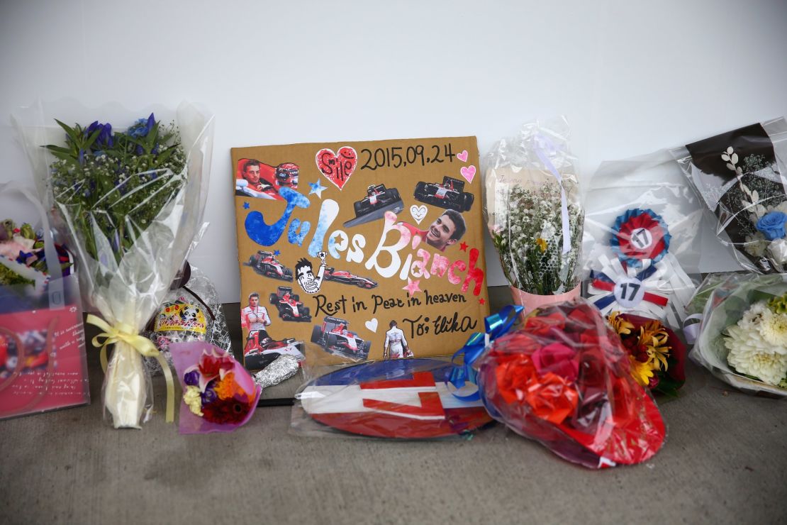Tributes were laid next to the Manor Marussia garage before the 2015 Japanese Grand Prix.