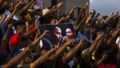 Demonstrators march at the Louisiana Capitol  on Saturday to protest the shooting of Alton Sterling.
