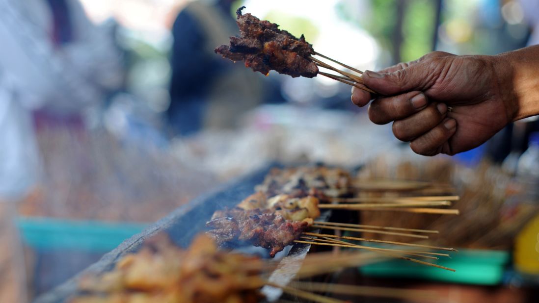 The best satay sticks in Bali are marinated in turmeric, barbecued over coals and then coated with a generous dose of peanut sauce.