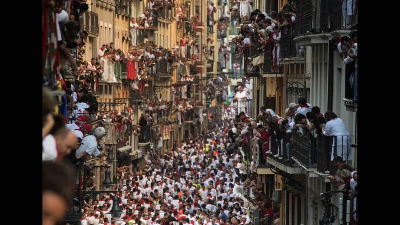 Spectators watch from balconies during the annual "running of the bulls."
