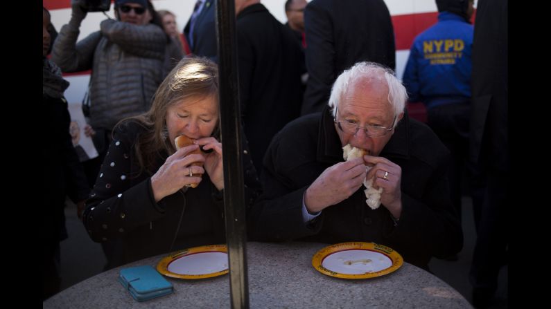 Sen. Bernie Sanders, an independent from Vermont and a 2016 Democratic presidential candidate (right), and his wife Jane ate Nathan's Famous hot dogs after a campaign event in Brooklyn on April 10, 2016.