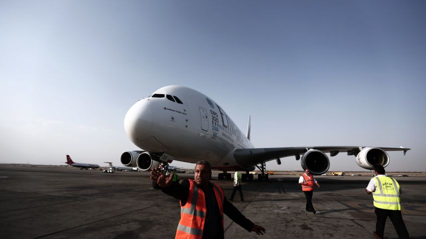 An Airbus A380-800 airctaft of Emirates Airline sits on the tarmac after landing at Tehran's IKA airport on September 30, 2014. Dubai's Emirates Airline made a one-off flight to the Iranian capital, for the first time with its flagship Airbus A380 plane to celebrate its recent introduction of more flights on the route. AFP PHOTO/BEHROUZ MEHRI        (Photo credit should read BEHROUZ MEHRI/AFP/Getty Images)