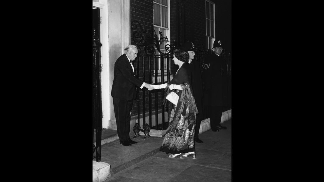 British Prime Minister Harold Wilson shaking hands with the Queen outside 10 Downing Street, following his resignation, London, March 24, 1976.