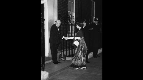 British Prime Minister Harold Wilson shaking hands with the Queen outside 10 Downing Street, following his resignation, London, March 24, 1976.