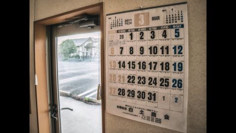 A calendar, stuck in time, shows the date March 3, 2011. More than 20,000 people were reported dead or missing in the aftermath of the earthquake and tsunami, while hundreds of thousands more lost their homes.