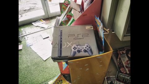 A Playstation 2 box is seen.