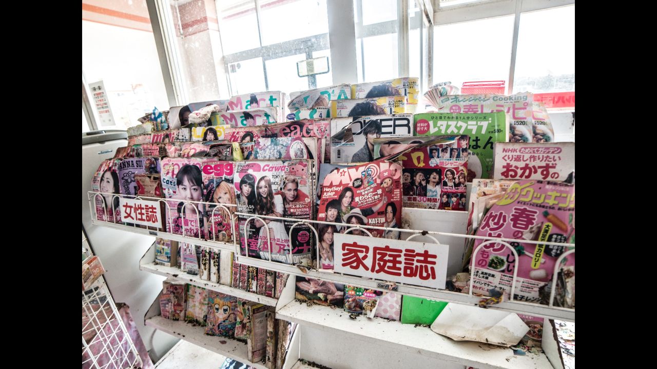 A selection of magazines at a supermarket, all dating back to 2011.