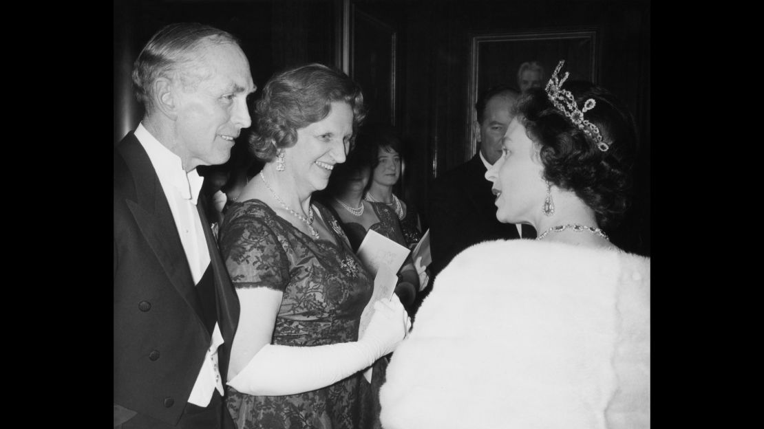 The Queen meets former Prime Minister Sir Alec Douglas-Home and Lady Home at County Hall in London, November, 11 1964.