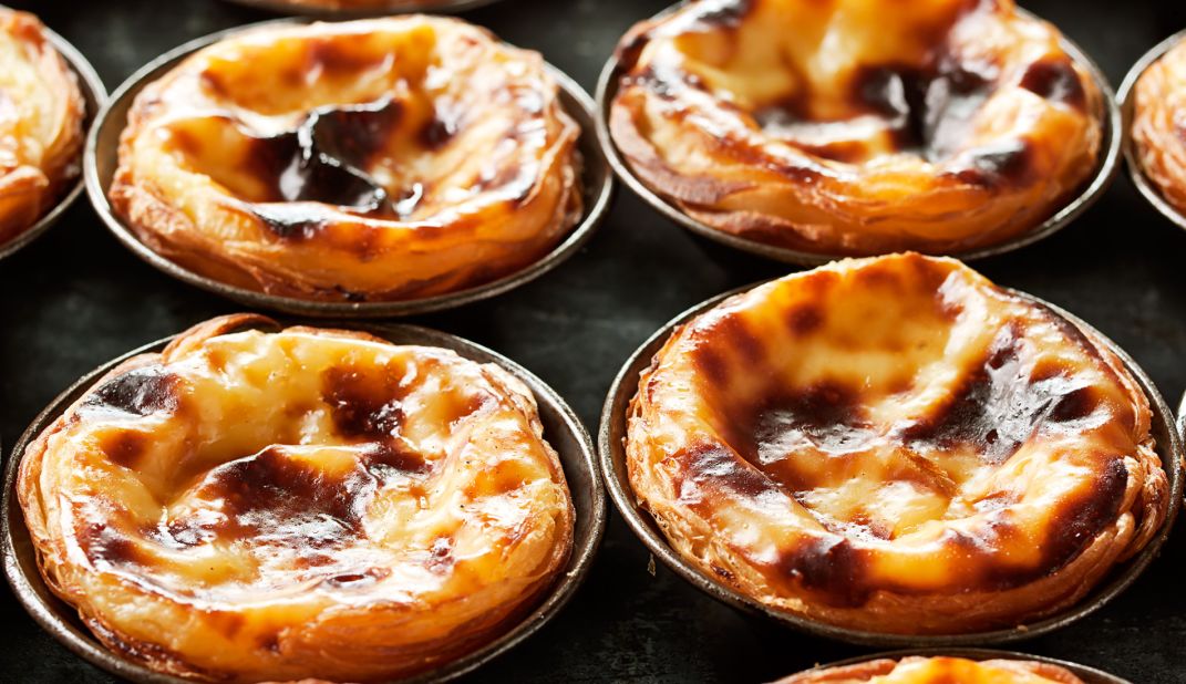 <strong>Pastel de nata, Portugal:</strong> Legend has it that Portuguese nuns and monks first conjured up these sinfully delicious custard tarts. 
