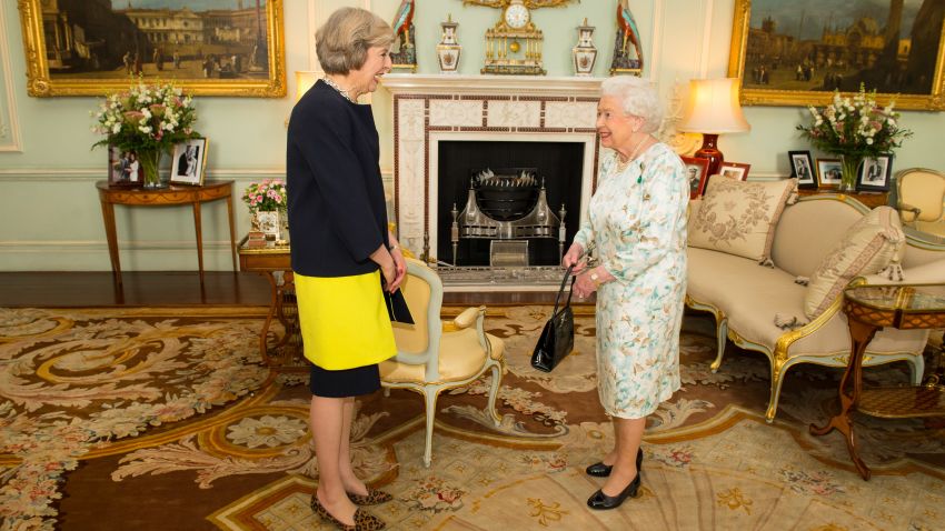 LONDON, ENGLAND - JULY 13:  Queen Elizabeth II welcomes Theresa May at the start of an audience where she invited the former Home Secretary to become Prime Minister and form a new government at  Buckingham Palace on July 13, 2016 in London, England. Former Home Secretary Theresa May becomes the UK's second female Prime Minister after she was selected unopposed by Conservative MPs to be their new party leader. She is currently MP for Maidenhead. (Photo by Dominic Lipinski - WPA Pool/Getty Images)