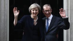 LONDON, ENGLAND - JULY 13:  British Prime Minister Theresa May and husband Philip May wave outside 10 Downing Street on July 13, 2016 in London, England. Former Home Secretary Theresa May becomes the UK's second female Prime Minister after she was selected unopposed by Conservative MPs to be their new party leader. She is currently MP for Maidenhead.  (Photo by Carl Court/Getty Images)