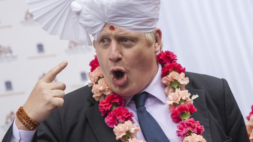 LONDON, ENGLAND - MAY 28:  The Mayor of London Boris Johnson wears a traditional headdress during a visit to the Shree Swaminarayan Mandir, a major new Hindu temple being built in Kingsbury on May 28, 2014 in London, England.  The Mayor met with religious and community leaders and toured the new complex. The temple, set to fully open in August, has cost ?20 million to build, all of the money being raised by the community and through the sale of its previous site in Golders Green, which is being developed for housing.  (Photo by Rob Stothard/Getty Images)