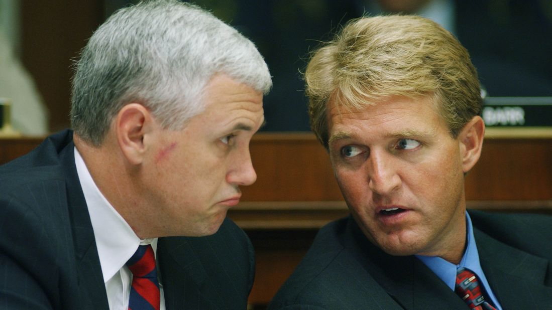 Pence talks with US Sen. Jeff Flake in 2002, during the markup of a bill that would establish the Department of Homeland Security.