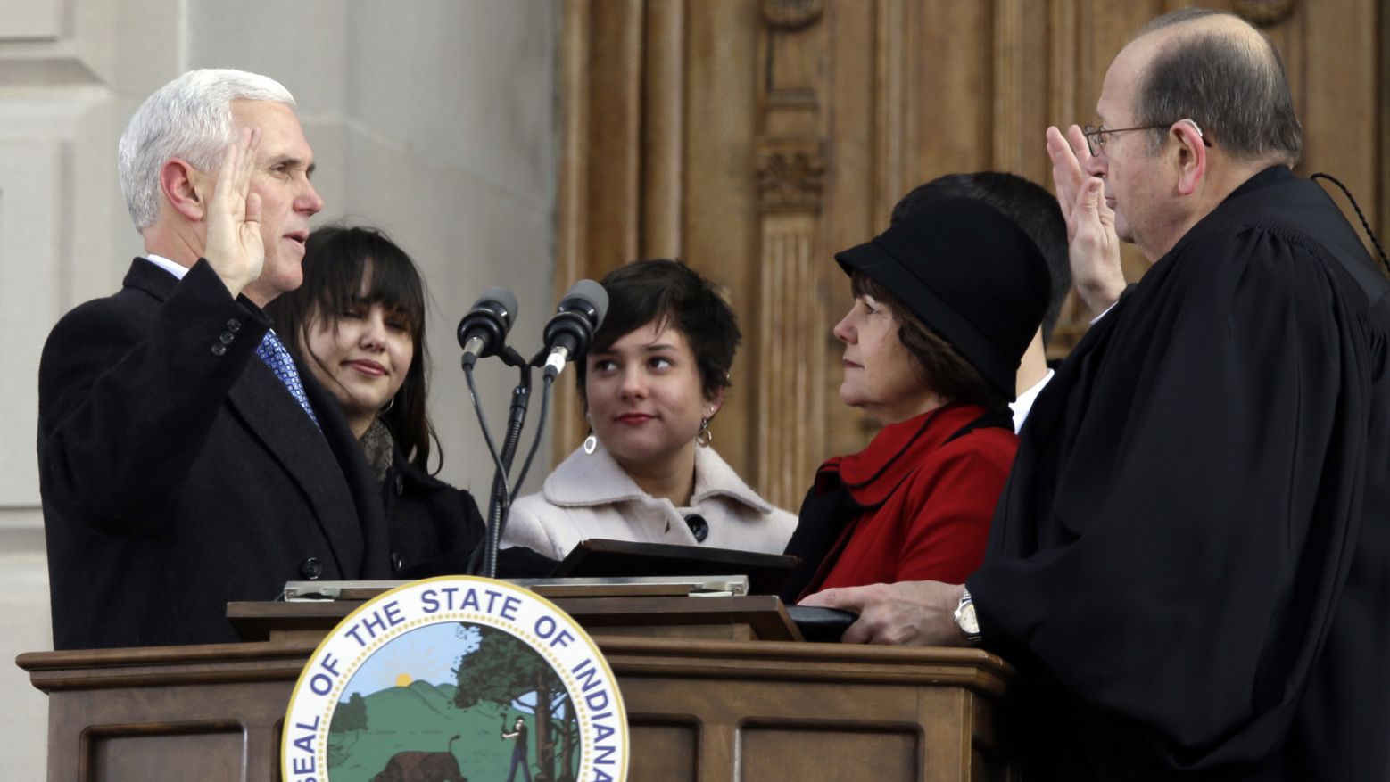 Pence is sworn in as Indiana's 50th governor in 2013.