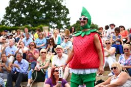"Strawberry Man" watches the tennis from Murray mound.