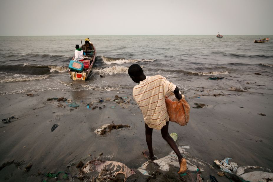 Fishermen preparing their boats at Joal beach in Senegal.