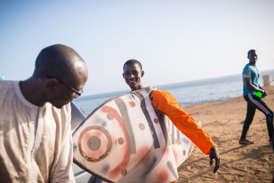 Ahmed Diamé, Greenpeace Oceans campaigner, and Abdou, Greenpeace volunteer during an activity in Dakar, where hundreds of oceans lovers, fishers and Greenpeace volunteers celebrate World Oceans Day.  