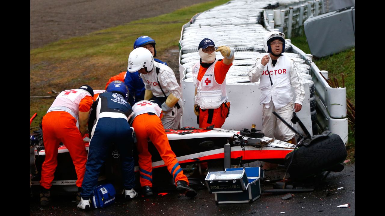 Bianchi receives urgent medical treatment after crashing during the Japanese GP at the Suzuka Circuit. The crash was seen by millions of F1 fans watching around the world.