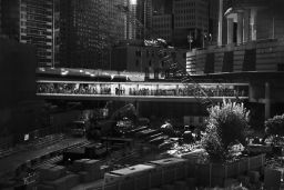 Pedestrians cross an overpass in downtown Hong Kong. (Alfred Ko)