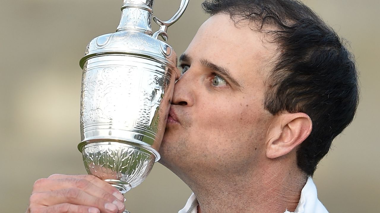Zach Johnson kisses the Claret Jug after winning the 144th Open Championship in 2015.