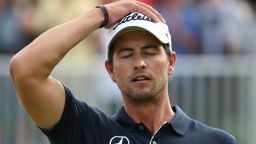 LYTHAM ST ANNES, ENGLAND - JULY 22:  Adam Scott of Australia reacts to a missed par putt on the 18th green during the final round of the 141st Open Championship at Royal Lytham & St. Annes Golf Club on July 22, 2012 in Lytham St Annes, England.  (Photo by Andrew Redington/Getty Images)