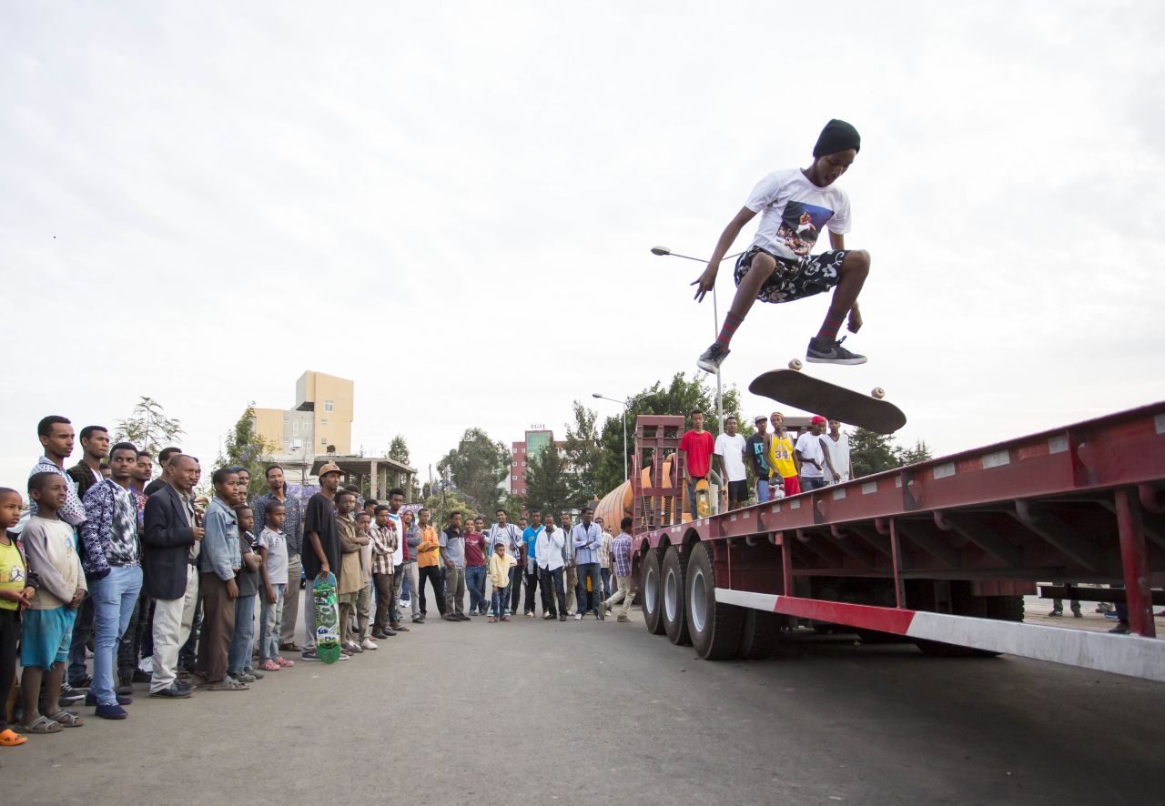 The crew skate across trucks, cars and other high structures in their neighborhood to practice their jumps. 