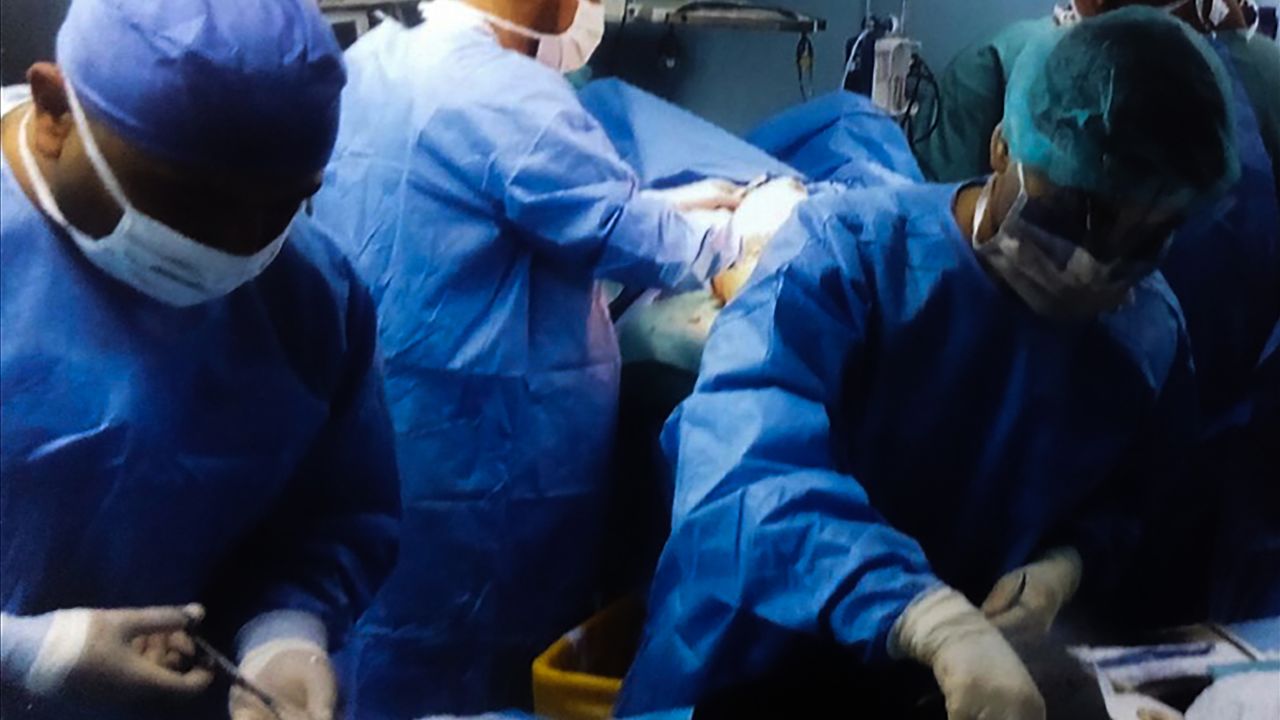 Surgeons -- who cannot be named to protect their identity -- perform surgery.
